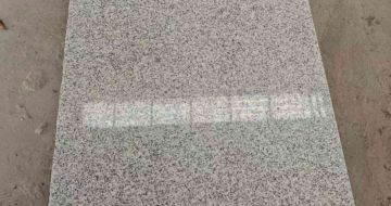 周口芝麻白光面毛板