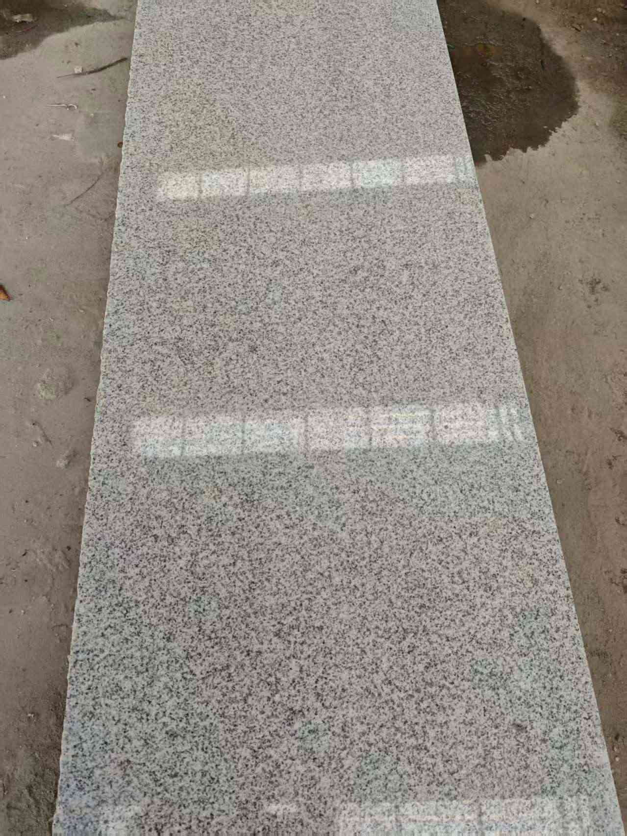 周口芝麻白光面毛板